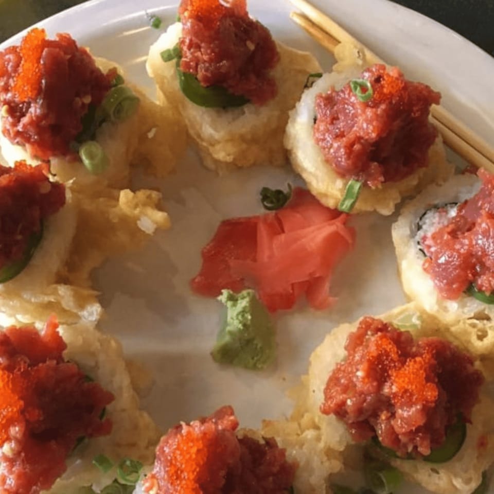 Tokyo Dori Sushi and Grill's deep-fried sushi rolls topped with spicy tuna, roe, and green onions.